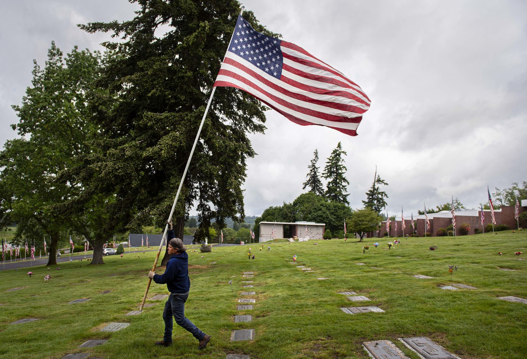 Flags line Longview Memorial Park